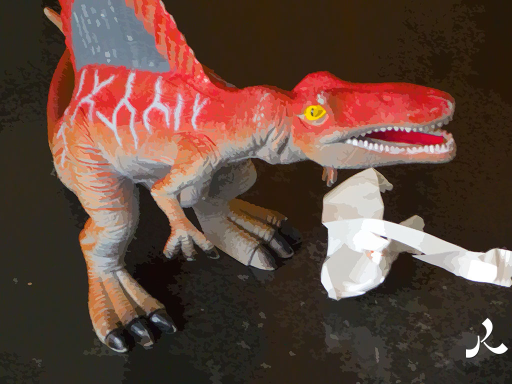 le dinosaure et le papier à jeter