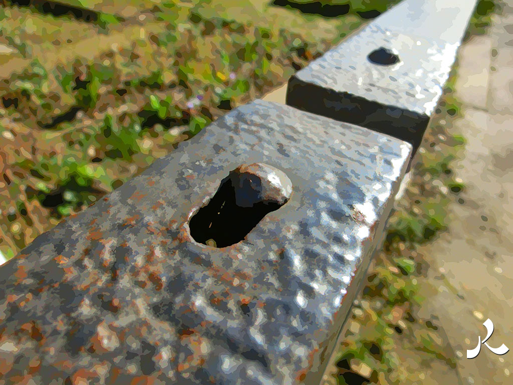 grille de fer au soleil