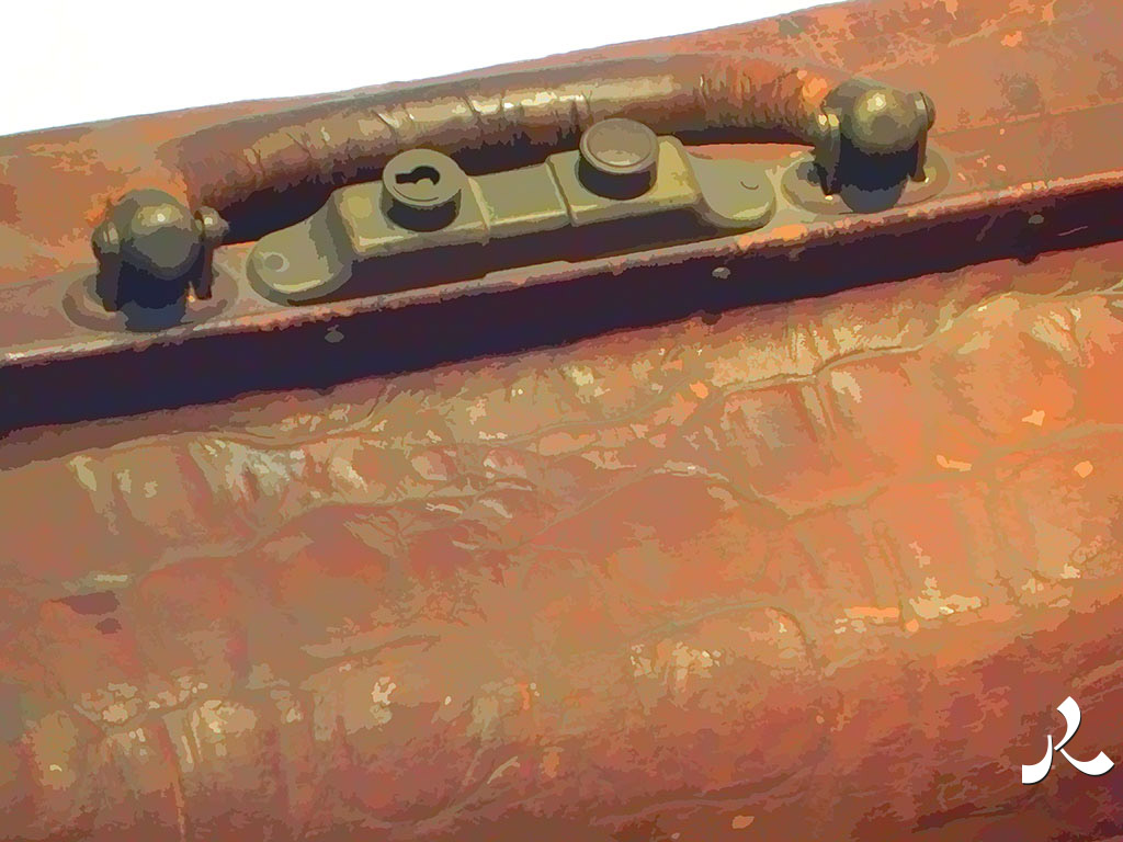 poignée de vieille sacoche