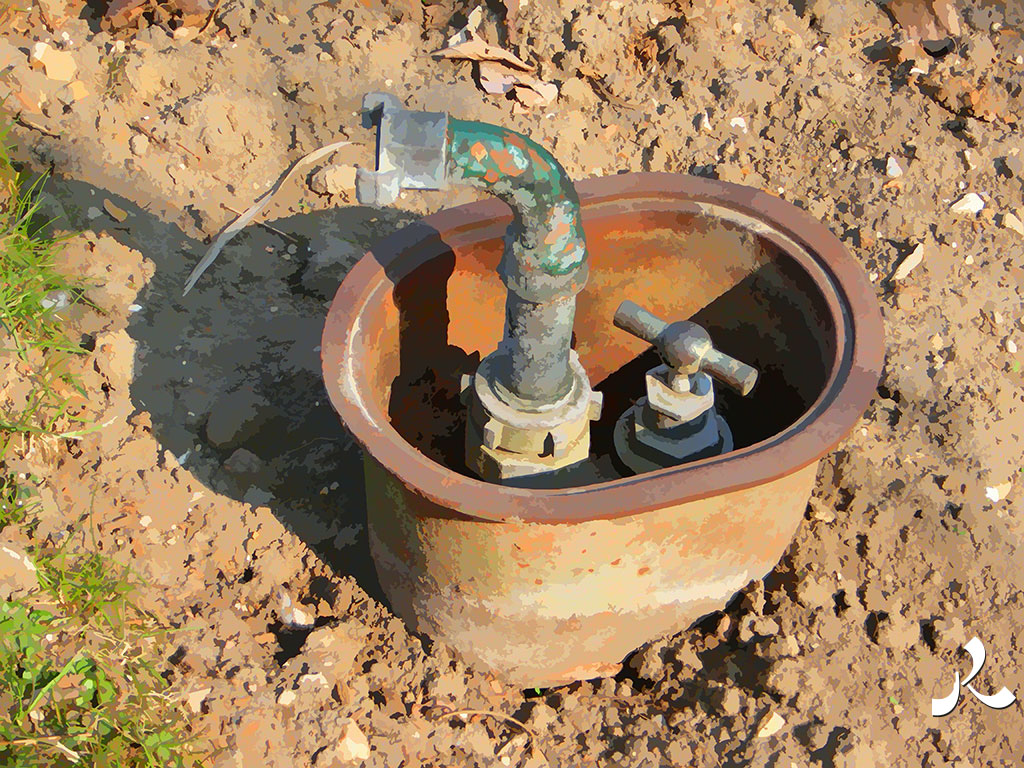 un robinet dans un jardin parisien